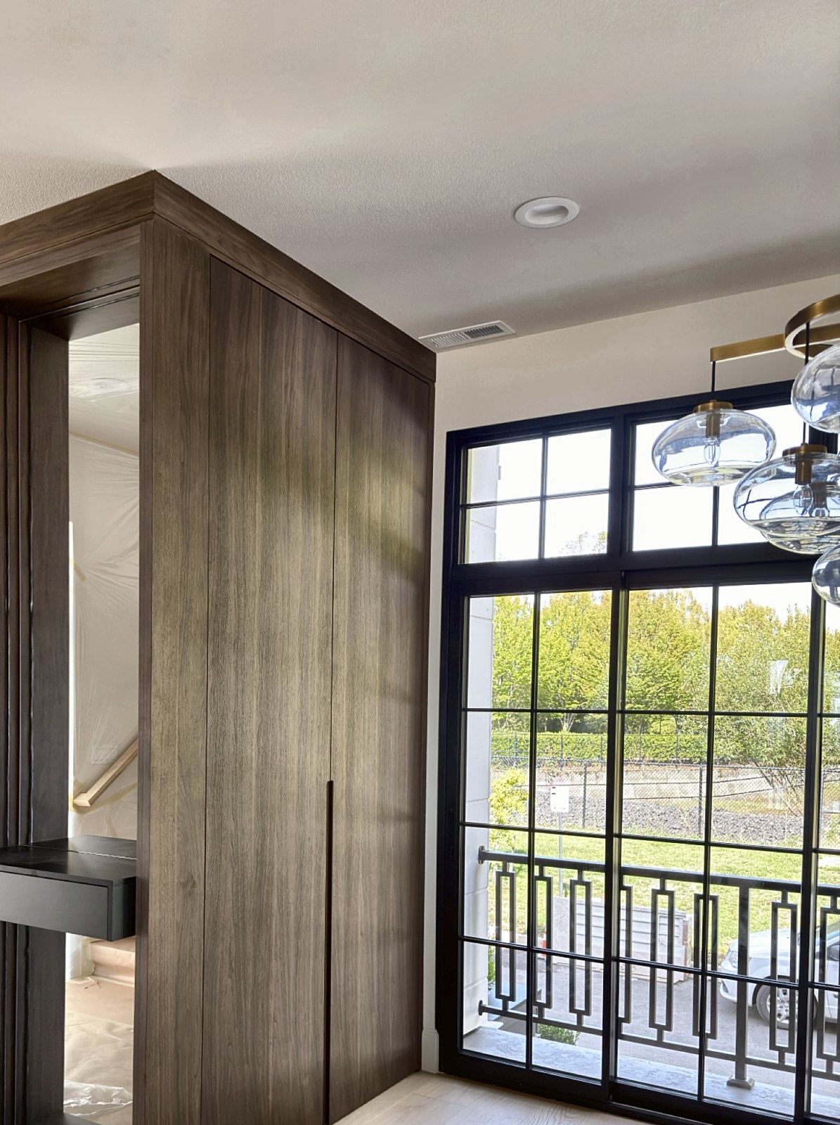 Walnut entry cabinet with mirror niche